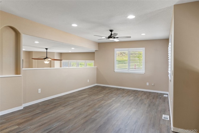 6405 Eagle Feather Trl, Littleton, CO 80125 - spare room with a ceiling fan, wood finished floors, baseboards, and recessed lighting