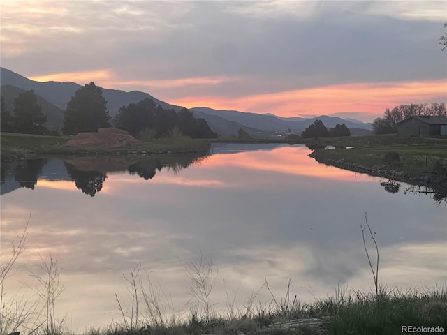 6405 Eagle Feather Trl, Littleton, CO 80125 - water view featuring a mountain backdrop