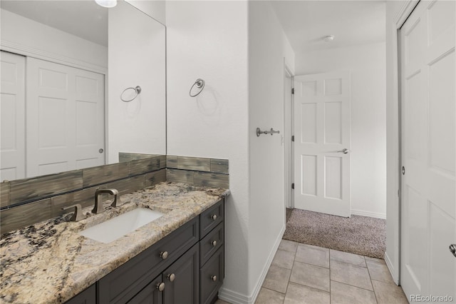 6405 Eagle Feather Trl, Littleton, CO 80125 - bathroom with vanity and baseboards