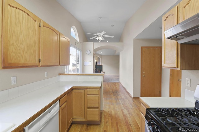 kitchen with kitchen peninsula, vaulted ceiling, extractor fan, dishwasher, and black gas stove