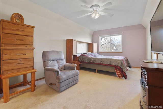 bedroom featuring ceiling fan, light colored carpet, and lofted ceiling