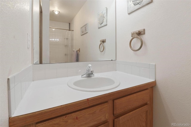 bathroom featuring vanity and walk in shower