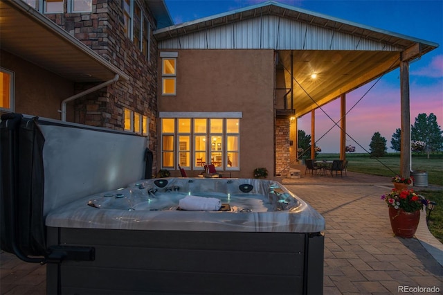 11881 County Road 37, Fort Lupton, CO 80621 - view of patio with a hot tub