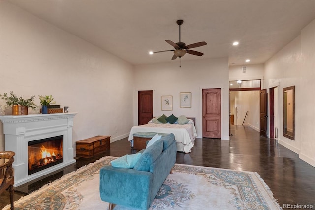 11881 County Road 37, Fort Lupton, CO 80621 - living room featuring a ceiling fan, dark wood-style flooring, recessed lighting, and a glass covered fireplace