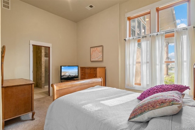 11881 County Road 37, Fort Lupton, CO 80621 - bedroom featuring carpet floors, a high ceiling, and ensuite bathroom