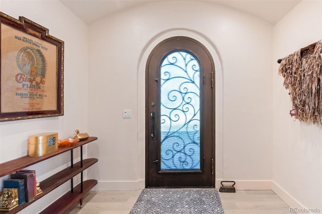 11881 County Road 37, Fort Lupton, CO 80621 - entrance foyer with arched walkways and light wood-type flooring
