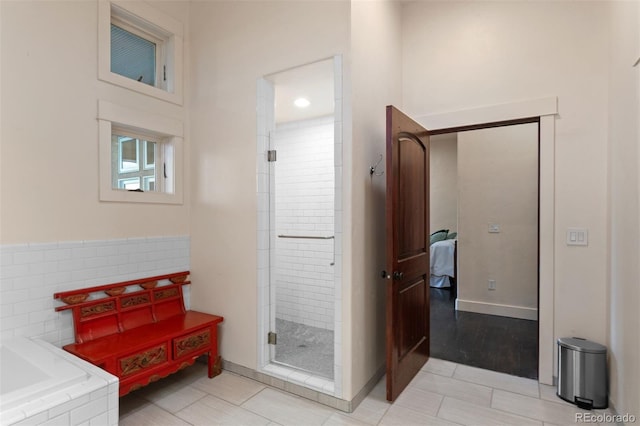 11881 County Road 37, Fort Lupton, CO 80621 - bathroom with a shower stall, connected bathroom, and a bath