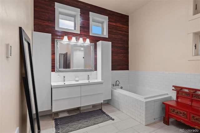 11881 County Road 37, Fort Lupton, CO 80621 - bathroom with double vanity, a garden tub, tile patterned flooring, and wooden walls