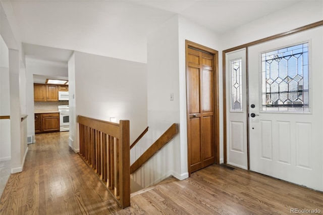 entrance foyer featuring light wood-type flooring