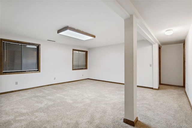 empty room featuring light colored carpet