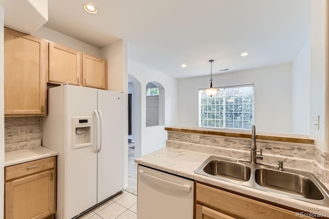 371 Granby Way Unit C, Aurora, CO 80011 - kitchen featuring white appliances, light brown cabinets, a sink, healthy amount of natural light, and recessed lighting