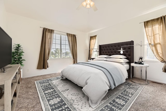 371 Granby Way Unit C, Aurora, CO 80011 - bedroom featuring carpet floors, multiple windows, and baseboards