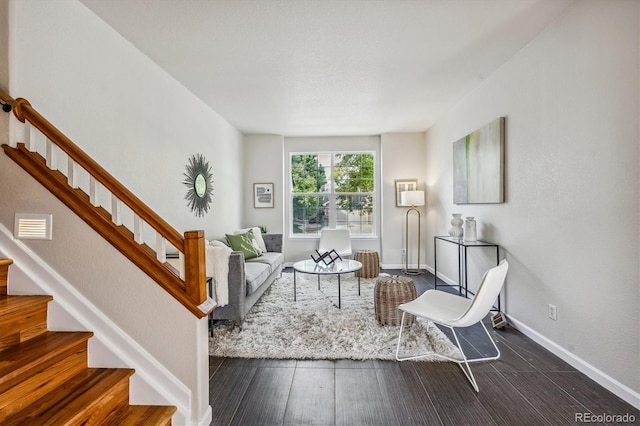 living room featuring dark hardwood / wood-style flooring