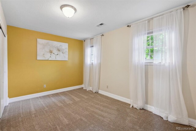 9306 Garrison Dr, Broomfield, CO 80021 - carpeted empty room with baseboards
