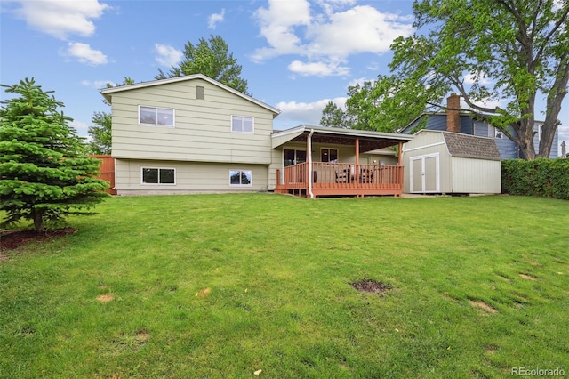 9306 Garrison Dr, Broomfield, CO 80021 - rear view of house with a deck and a yard