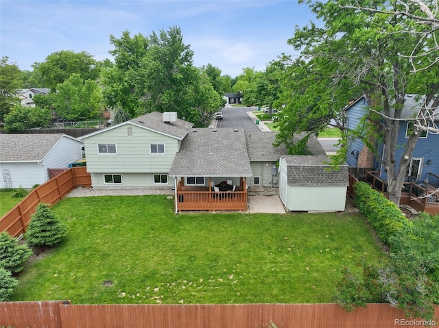 9306 Garrison Dr, Broomfield, CO 80021 - rear view of property with a wooden deck and roof with shingles