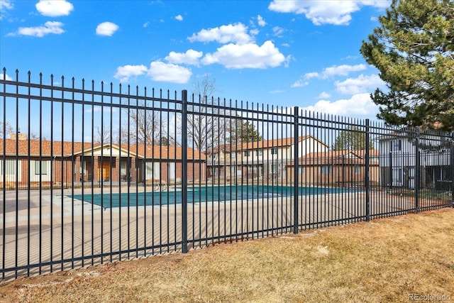 community pool featuring fence