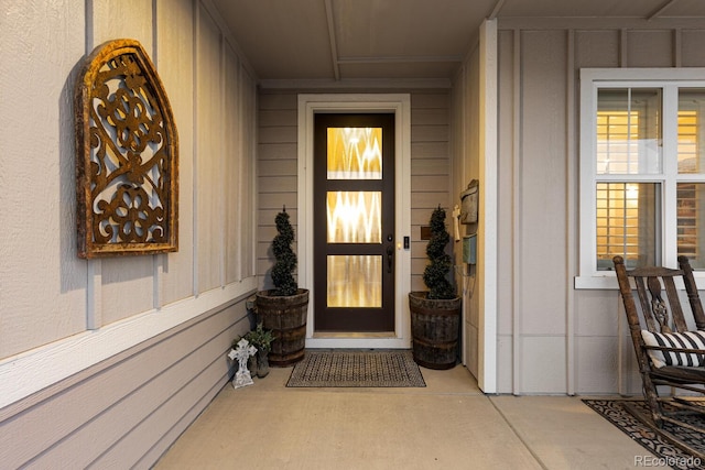 doorway to property with covered porch