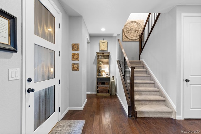 foyer featuring dark hardwood / wood-style floors