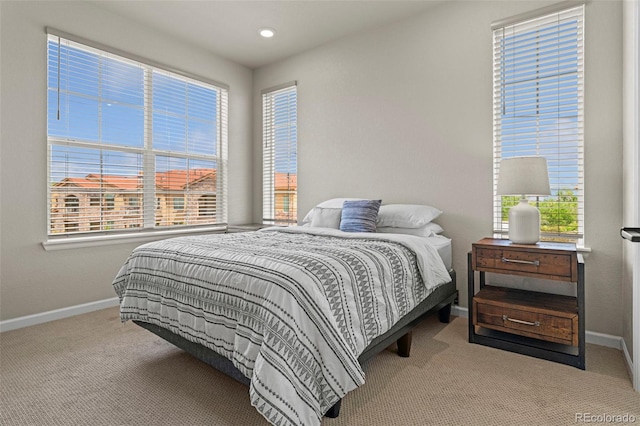 8387 Donati Ter Unit A, Littleton, CO 80129 - bedroom with carpet flooring, multiple windows, and recessed lighting