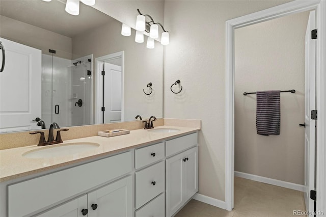 8387 Donati Ter Unit A, Littleton, CO 80129 - full bathroom featuring a shower stall, double vanity, and tile patterned floors