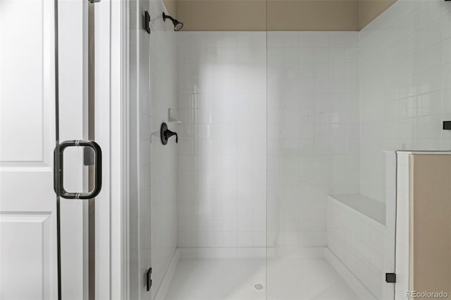 8387 Donati Ter Unit A, Littleton, CO 80129 - bathroom featuring a shower stall