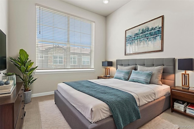 8387 Donati Ter Unit A, Littleton, CO 80129 - bedroom with light colored carpet and baseboards