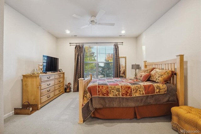 carpeted bedroom with ceiling fan