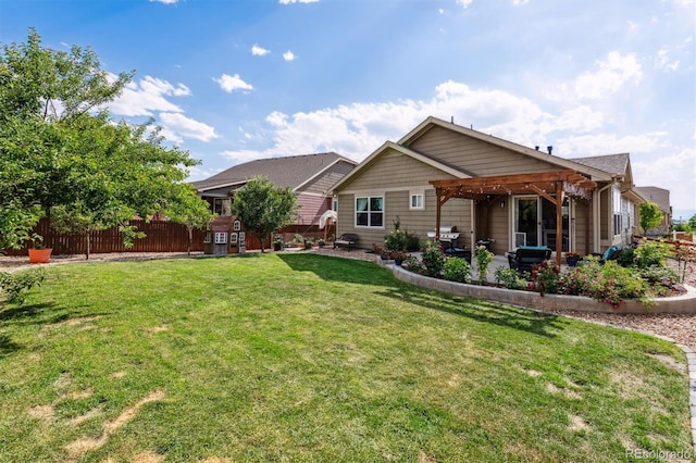 10288 Olathe Way, Commerce City, CO 80022 - rear view of property with a pergola and a patio area