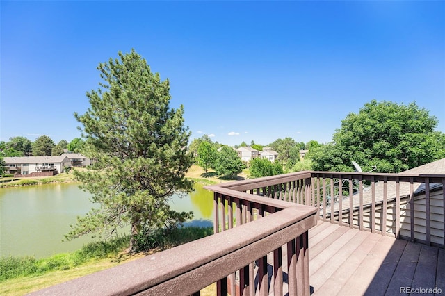 4541 W Ponds Cir, Littleton, CO 80123 - wooden terrace with a water view