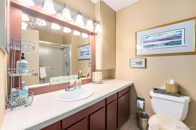 4541 W Ponds Cir, Littleton, CO 80123 - full bathroom featuring vanity, a shower stall, and tile patterned flooring