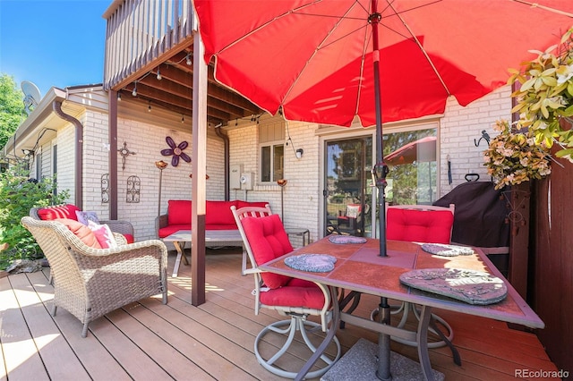 4541 W Ponds Cir, Littleton, CO 80123 - wooden deck with an outdoor living space, a grill, and outdoor dining space