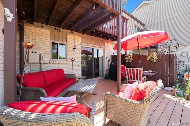 4541 W Ponds Cir, Littleton, CO 80123 - deck with an outdoor living space