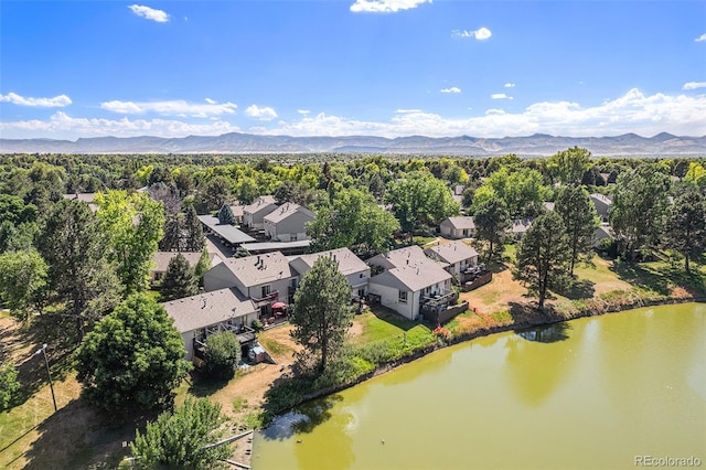 4541 W Ponds Cir, Littleton, CO 80123 - aerial view of residential area featuring a water and mountain view