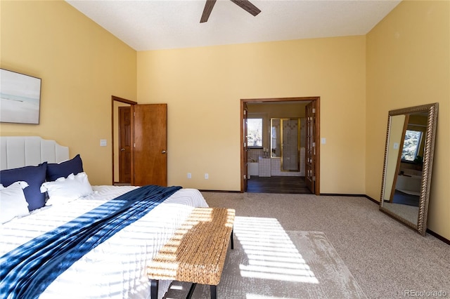 bedroom with ceiling fan, ensuite bathroom, and light carpet