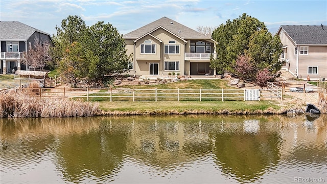 water view featuring a fenced backyard