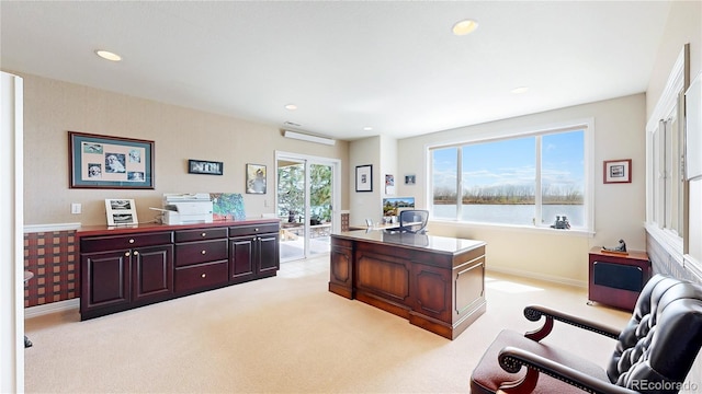 office area featuring recessed lighting, baseboards, and light carpet