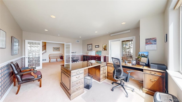 home office featuring light carpet, recessed lighting, and visible vents