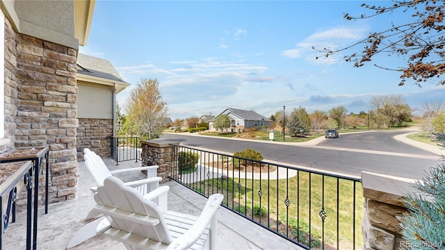 balcony with a porch and a residential view