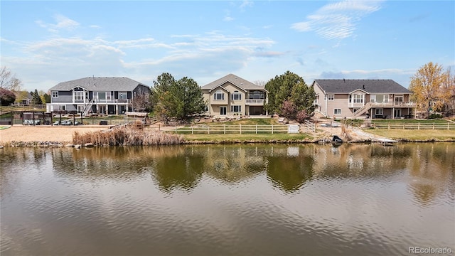 1738 Edgewater Pl, Longmont, CO 80504 - view of water feature featuring a fenced backyard and stairway