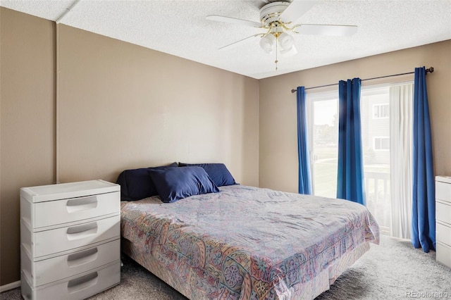 8100 W Quincy Ave Unit K3, Littleton, CO 80123 - carpeted bedroom featuring a textured ceiling and ceiling fan