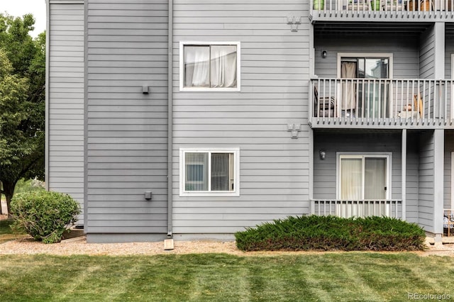 8100 W Quincy Ave Unit K3, Littleton, CO 80123 - back of house featuring a balcony and a yard