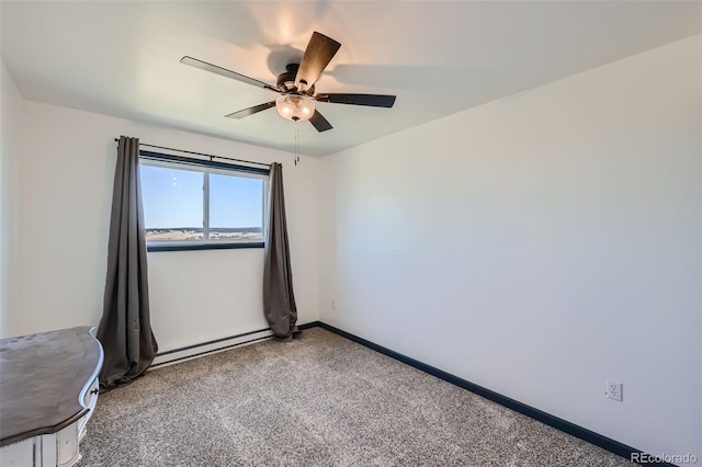 empty room featuring ceiling fan, baseboard heating, and carpet flooring