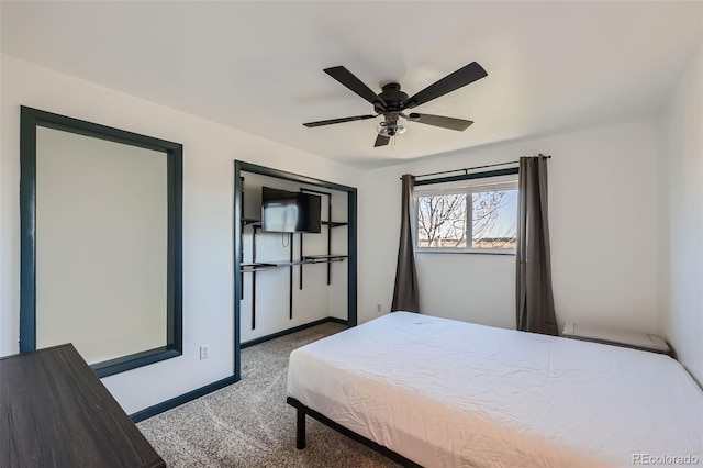 bedroom featuring a ceiling fan, baseboards, and carpet