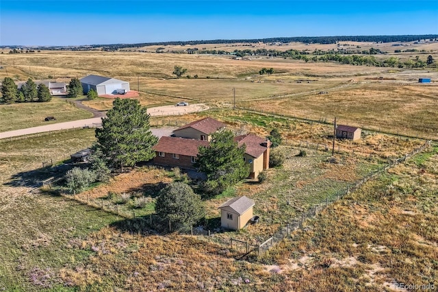 birds eye view of property featuring a rural view