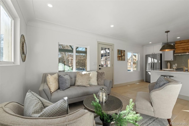 living room featuring light wood-type flooring