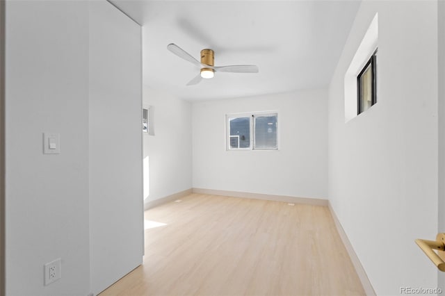 unfurnished room featuring ceiling fan and light hardwood / wood-style flooring