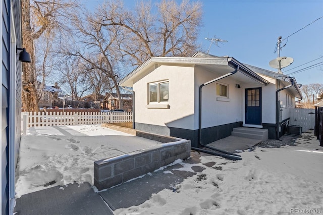 view of front of home with central AC unit