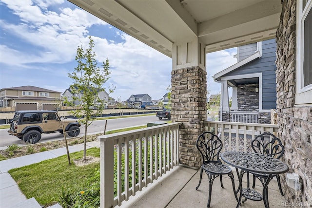 balcony featuring a porch