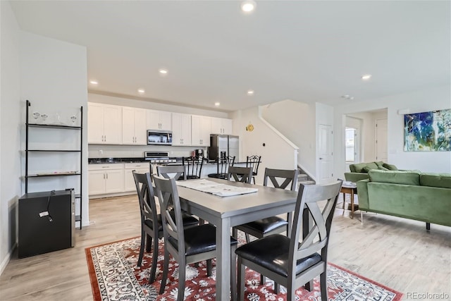 dining room featuring light wood-type flooring